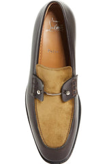 A single men's loafer shown from a top-down angle on a plain white background. The shoe features a dark brown leather toe cap and a tan suede vamp with a small center tab.