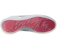 The outsole of a Christian Louboutin shoe, featuring a vibrant pink insole with the brand name 'Louboutin' written in white script, and a white outsole.