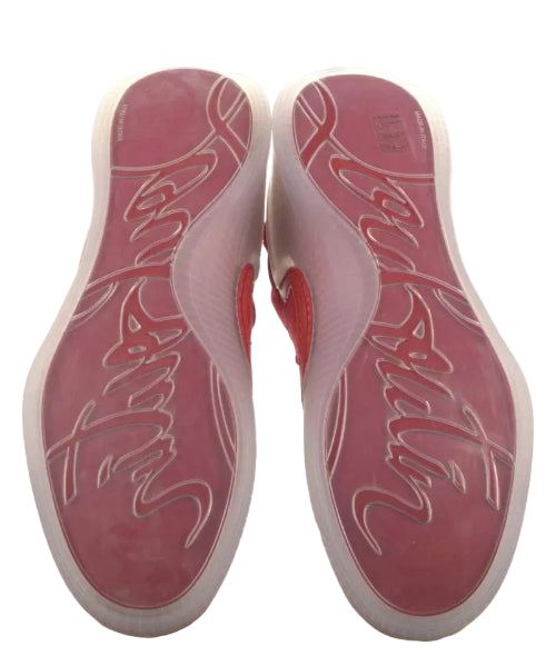 A pair of red and white sneakers shown from the bottom, displaying the custom embossed 'Bastille' logo on the soles.