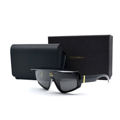 Black sunglasses with gold accents on a white background, featuring Dolce & Gabbana logo.