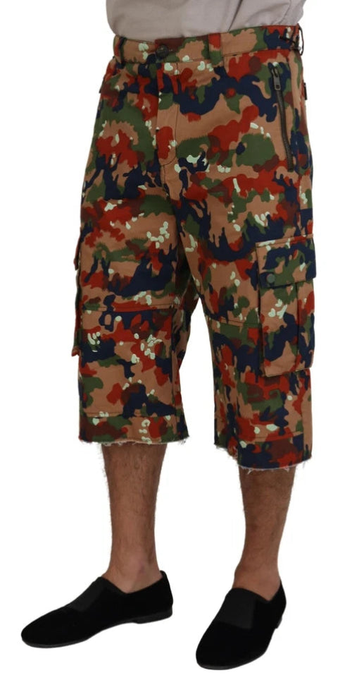 Camouflage shorts worn by a person on a white background