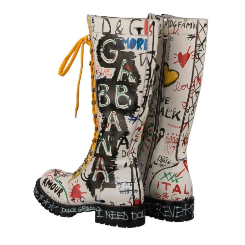 Graffiti-style boots with colorful text and designs on a white background
