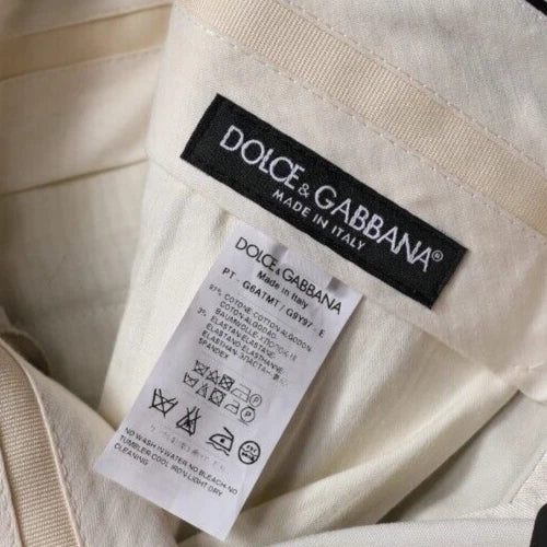 Dolce & Gabbana label on a garment with a white background