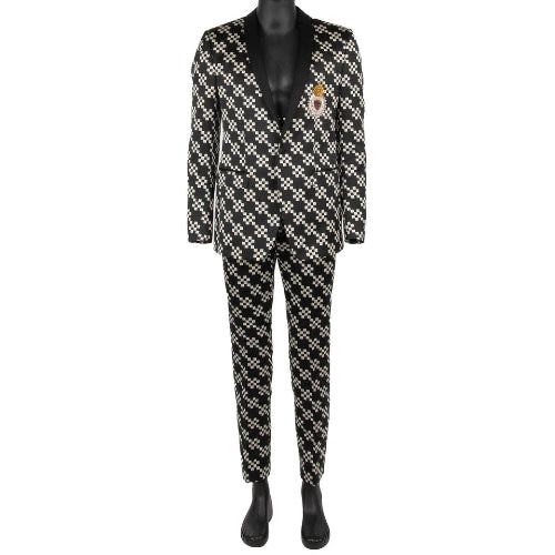 Black and white checkered suit on a mannequin against a white background