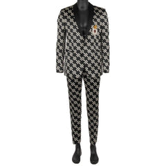 Black and white checkered suit on a mannequin against a white background
