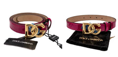 Dolce & Gabbana belt with gold logo on a marble surface