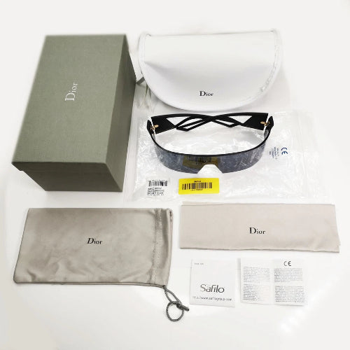 Dior sunglasses with packaging and accessories on a white background