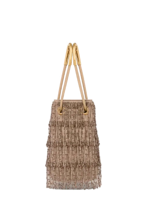 A woven straw tote bag with a natural tan color and light brown wooden handles, shown against a plain white background.
