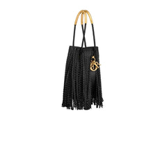 A black fringed bucket bag with gold-tone handles and a gold-tone hanging charm, shown on a light gray background with product text below.