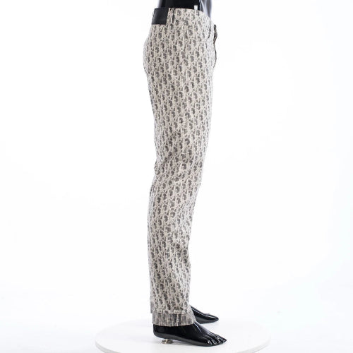 Patterned pants on a mannequin against a white background