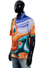 Mannequin wearing a colorful abstract-patterned shirt on a white background