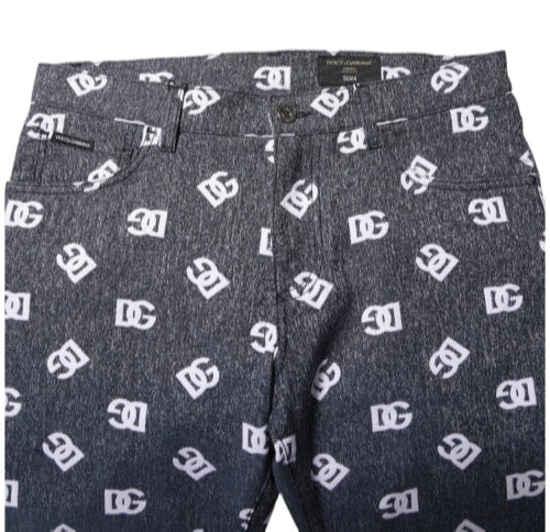 Dark jeans with a white logo pattern on a white background