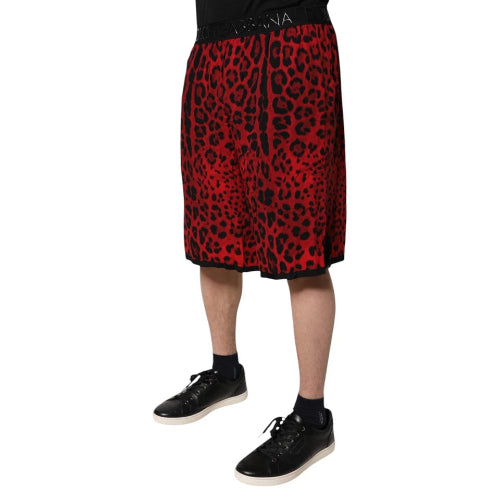Red leopard print skirt worn by a person on a white background