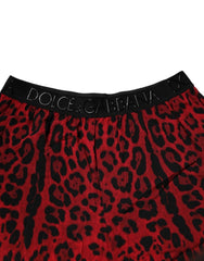 Red leopard print fabric with Dolce & Gabbana label on a white background