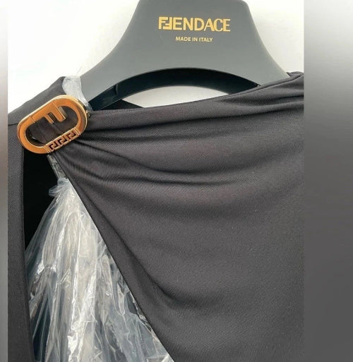 Gray garment on a hanger with 'FENDACE' branding, featuring a gold buckle.