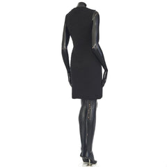 Black dress on a mannequin against a white background
