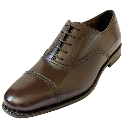 A dark brown leather lace-up dress shoe with a cap toe and polished finish, shown from a three-quarters angle on a white background.