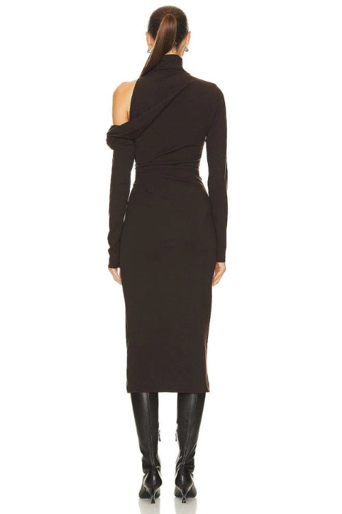 Woman wearing a black one-shoulder dress on a white background