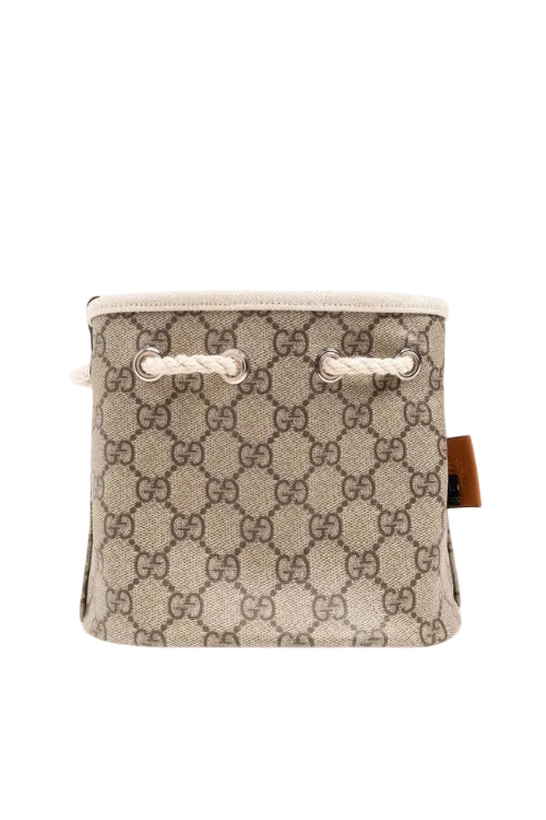 Beige patterned pouch with a brand logo on a beige background