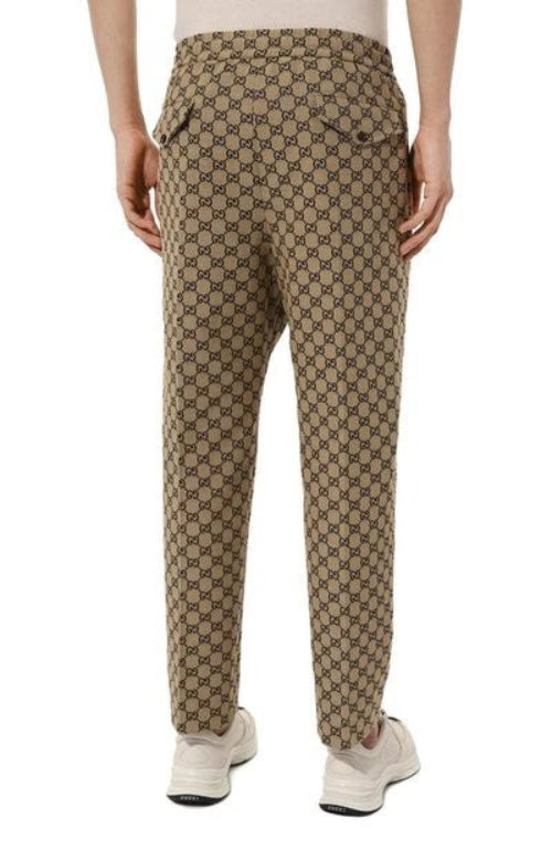 Patterned pants worn by a person on a white background