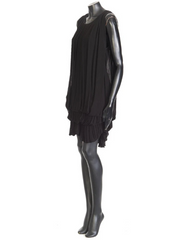 Black dress on a mannequin against a white background