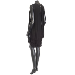 Black dress on a mannequin against a white background