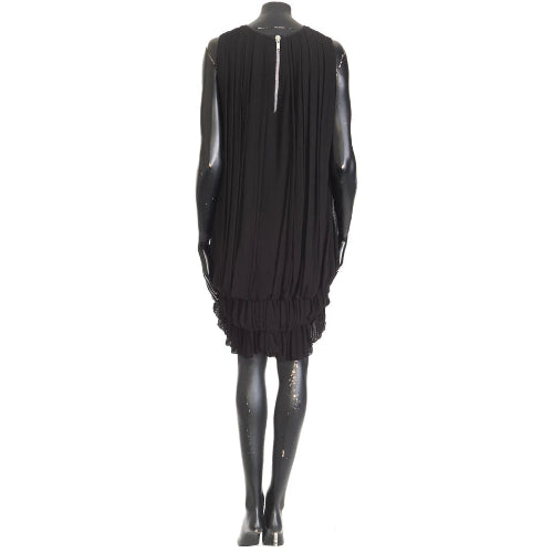 Black sleeveless dress on a mannequin against a white background