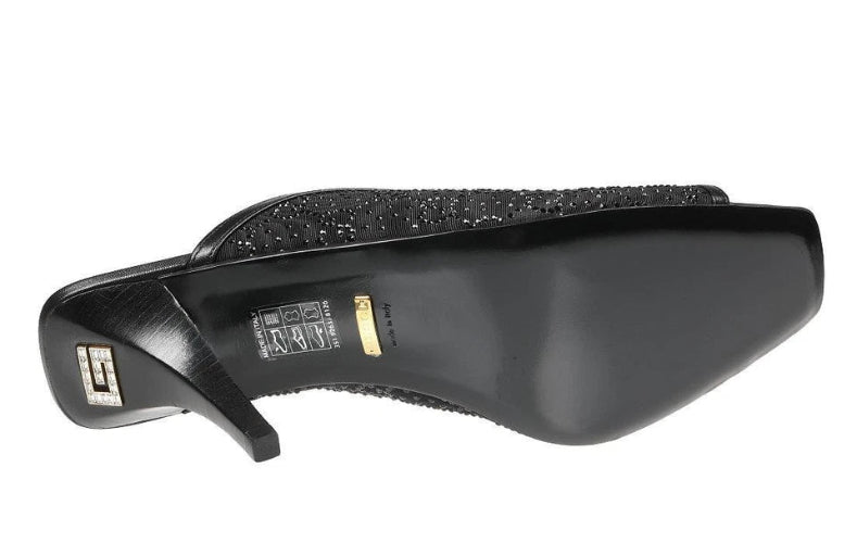 Black shoe with a textured heel and visible brand logo on a white background