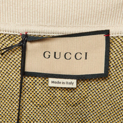 Gucci label on a product with a beige background