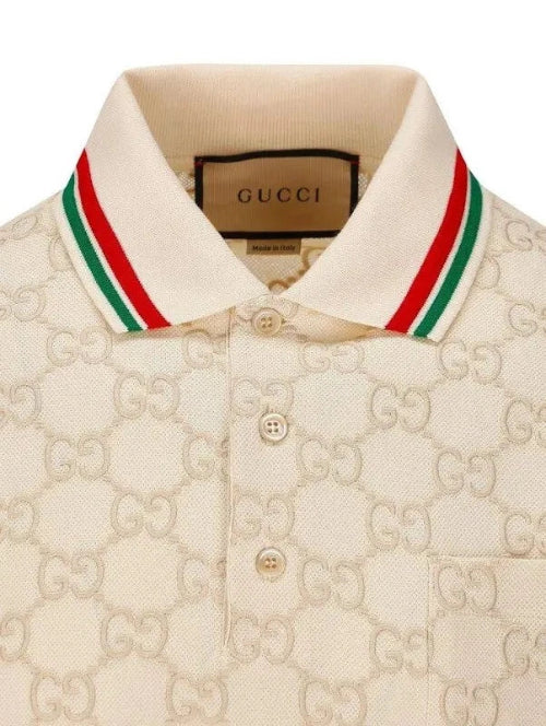 Beige Gucci polo shirt with red and green striped collar on a white background