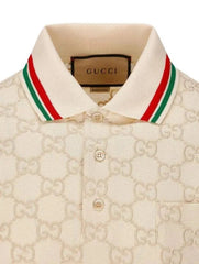 Beige Gucci polo shirt with red and green striped collar on a white background