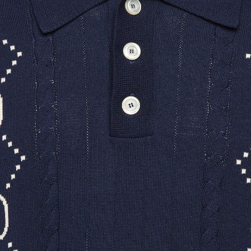 Navy blue fabric with white buttons and patterns
