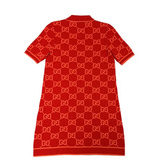 Red dress with a pattern on a light gray background