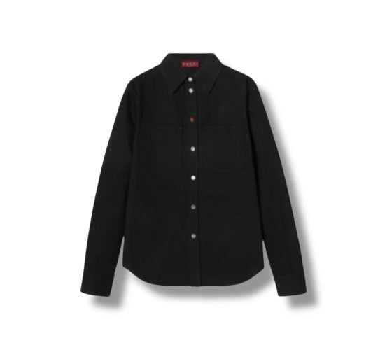 A black long-sleeve button-up shirt with two chest pockets, displayed flat against a white background.