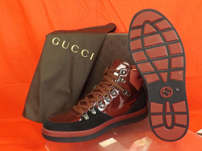 Gucci shoes with a matching box on a white background
