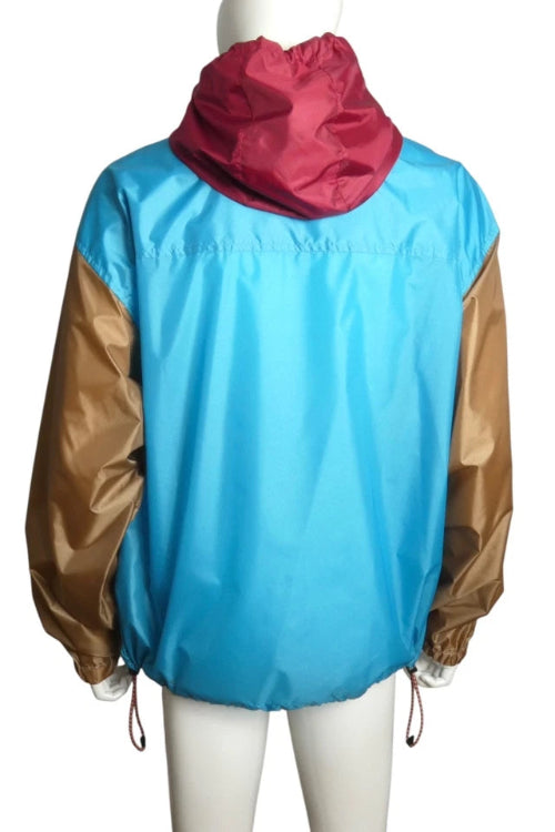 Blue jacket with brown sleeves and a red hood on a white background