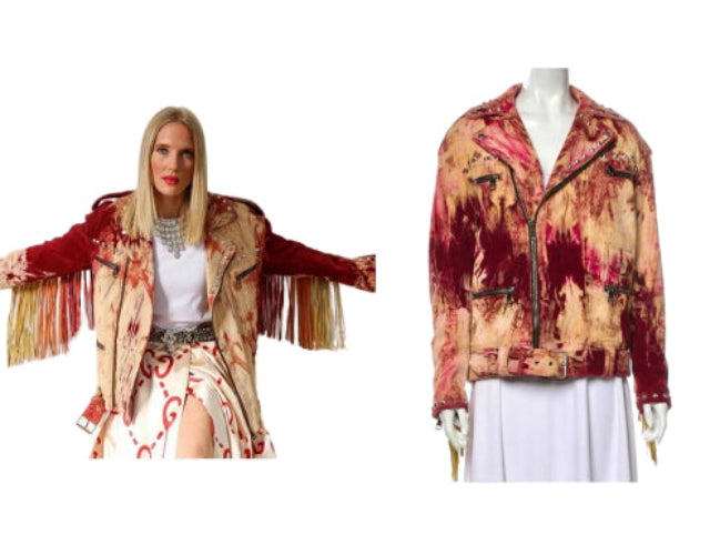 Woman wearing a colorful jacket with fringe and a mannequin displaying a similar jacket.