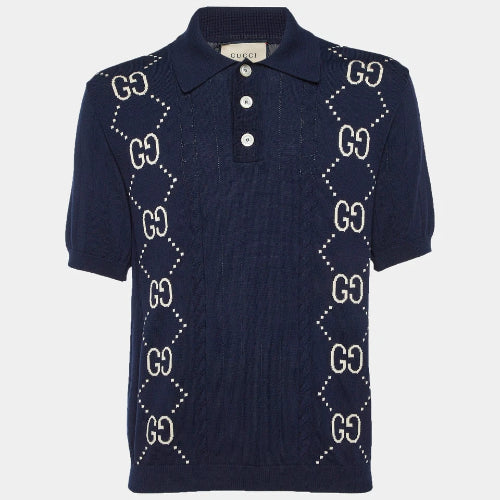 Navy blue polo shirt with Gucci logo design on a white background