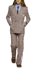 Person wearing a plaid suit walking on a runway.