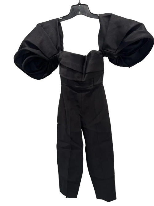 Black jumpsuit with a textured texture on a white background