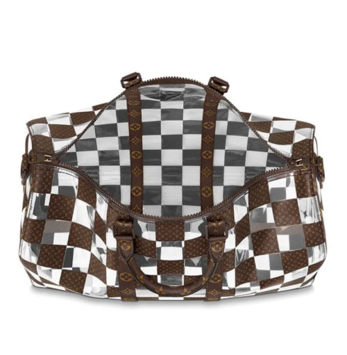 Checkered patterned bag with brown accents on a white background