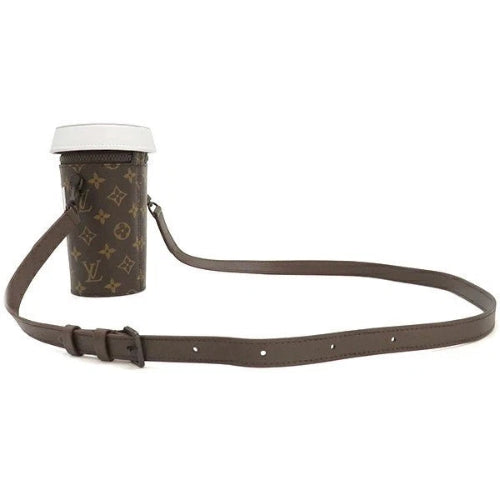 Brown leather crossbody bag with a cylindrical pouch on a white background