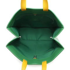 Green bag with yellow handles on a white background