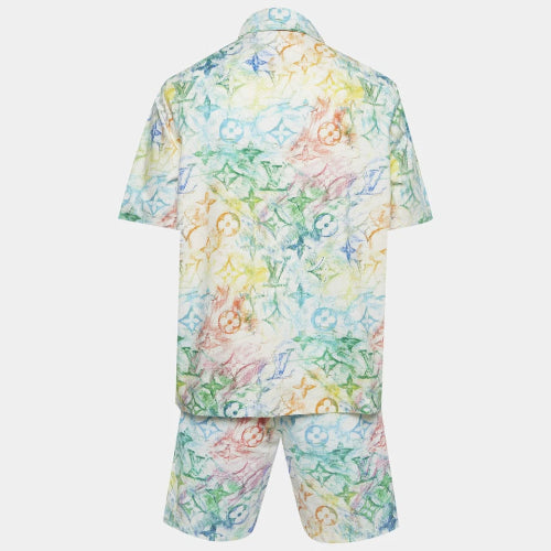 Colorful patterned shirt and shorts set on a white background