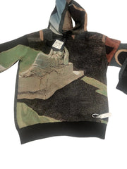 Camouflage-patterned hoodie on a white background