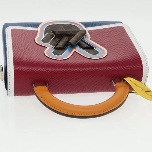 Designer handbag with visible brand logo on a white background