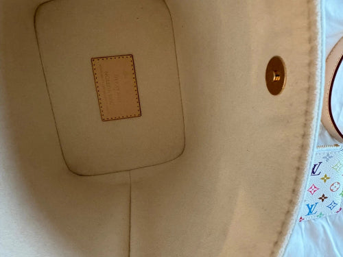 Beige fabric with a brand label on a white background