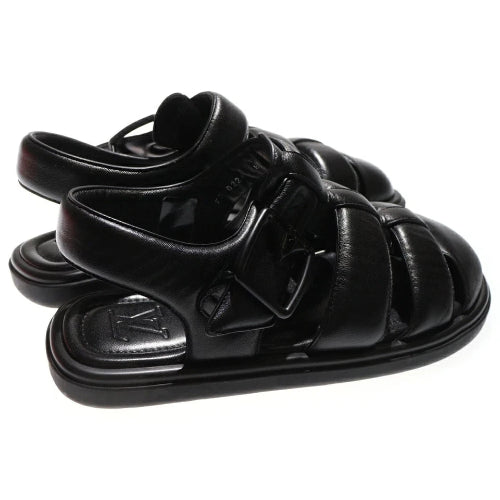 Black sandals on a white background