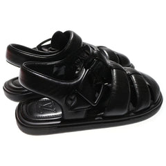 Black sandals on a white background