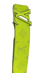 Neon green belt with a brand logo on a white background